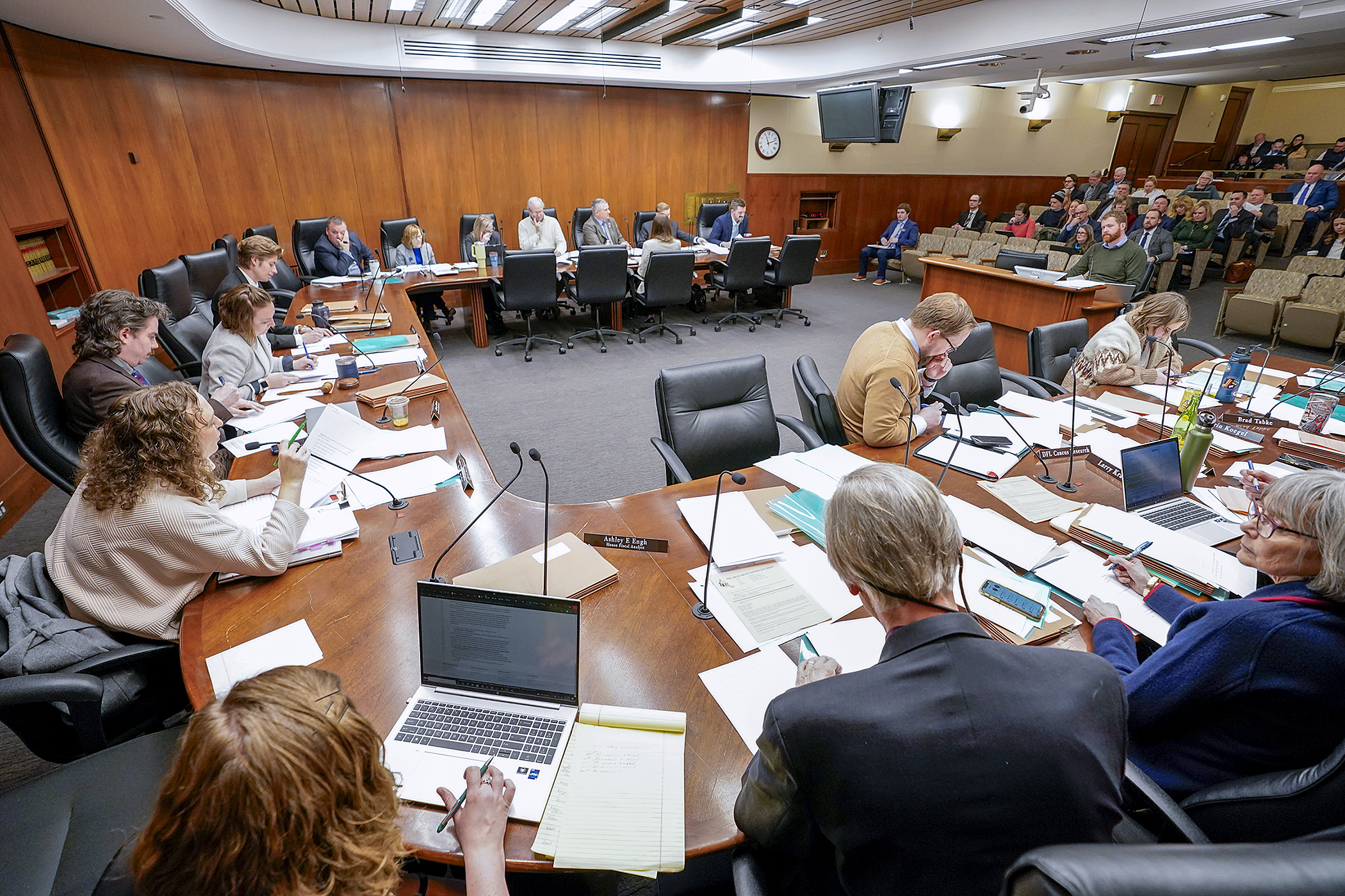 The House Commerce Finance and Policy Committee discusses amendments to HF4077, the committee’s policy bill March 22, sponsored by Rep. Zack Stephenson who chairs the panel. (Photo by Michele Jokinen)